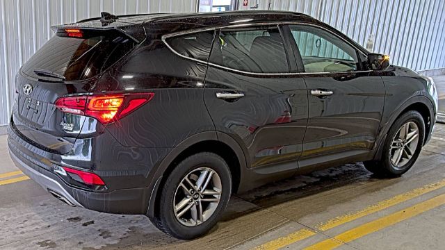 hyundai santa fe 2018 5NMZUDLB9JH077824 image